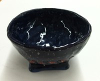 dark blue ceramic bowl